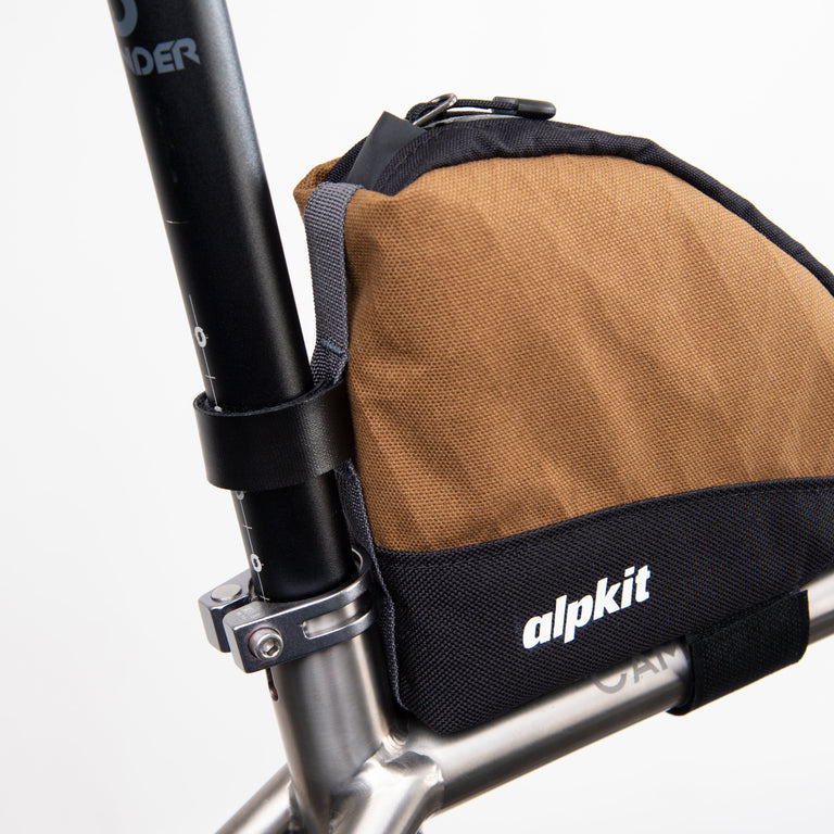 alpkit fuel pod rear bikepacking bag in mountain brown seat post strap