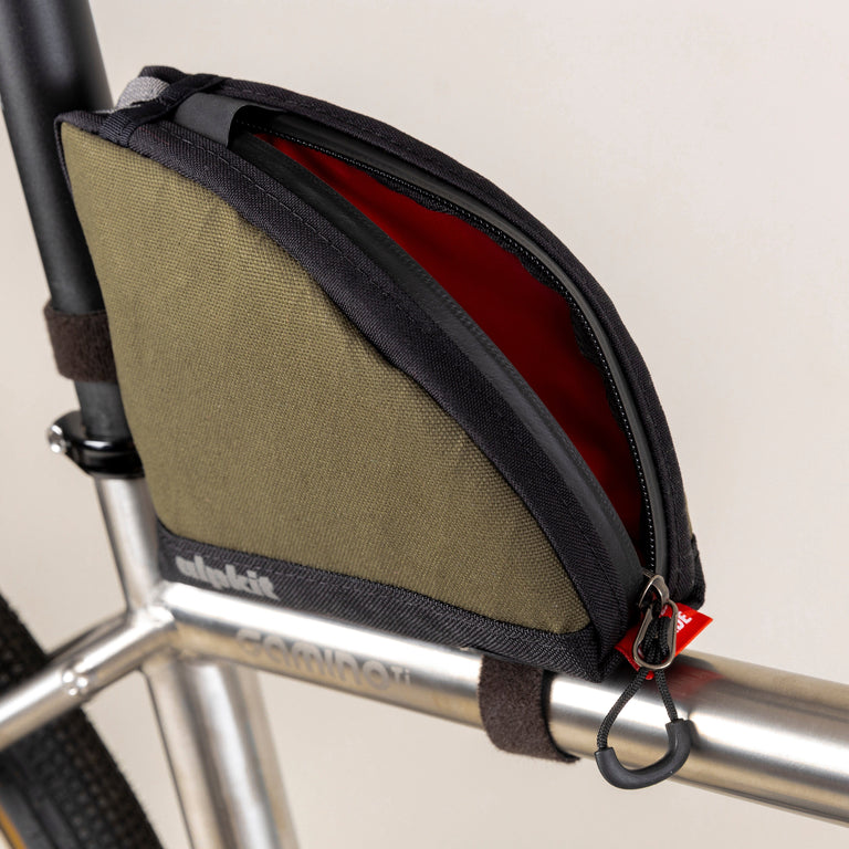 alpkit fuel pod rear bikepacking bag in olive green open