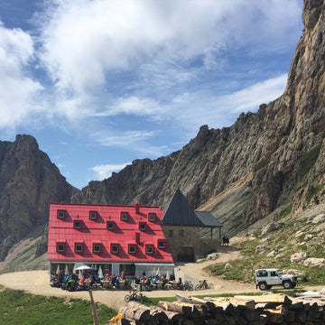 Backpacking in the Alps with a loaded rucksack