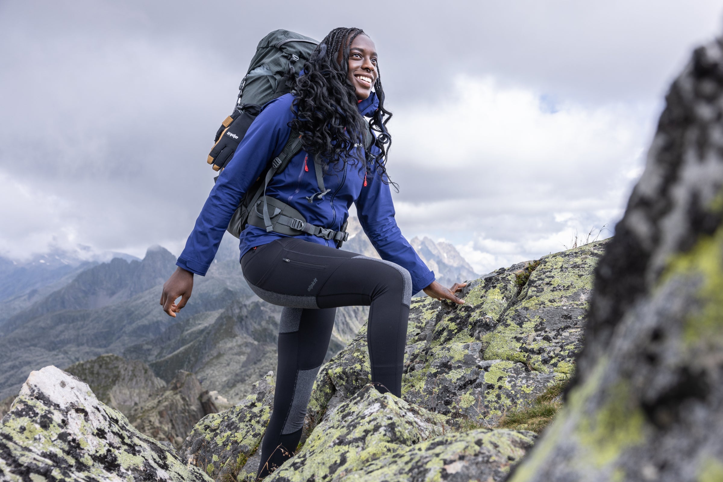 Woman climbing in the Alps