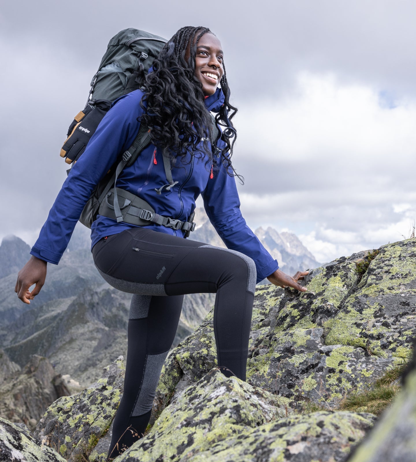 Woman climbing in the Alps