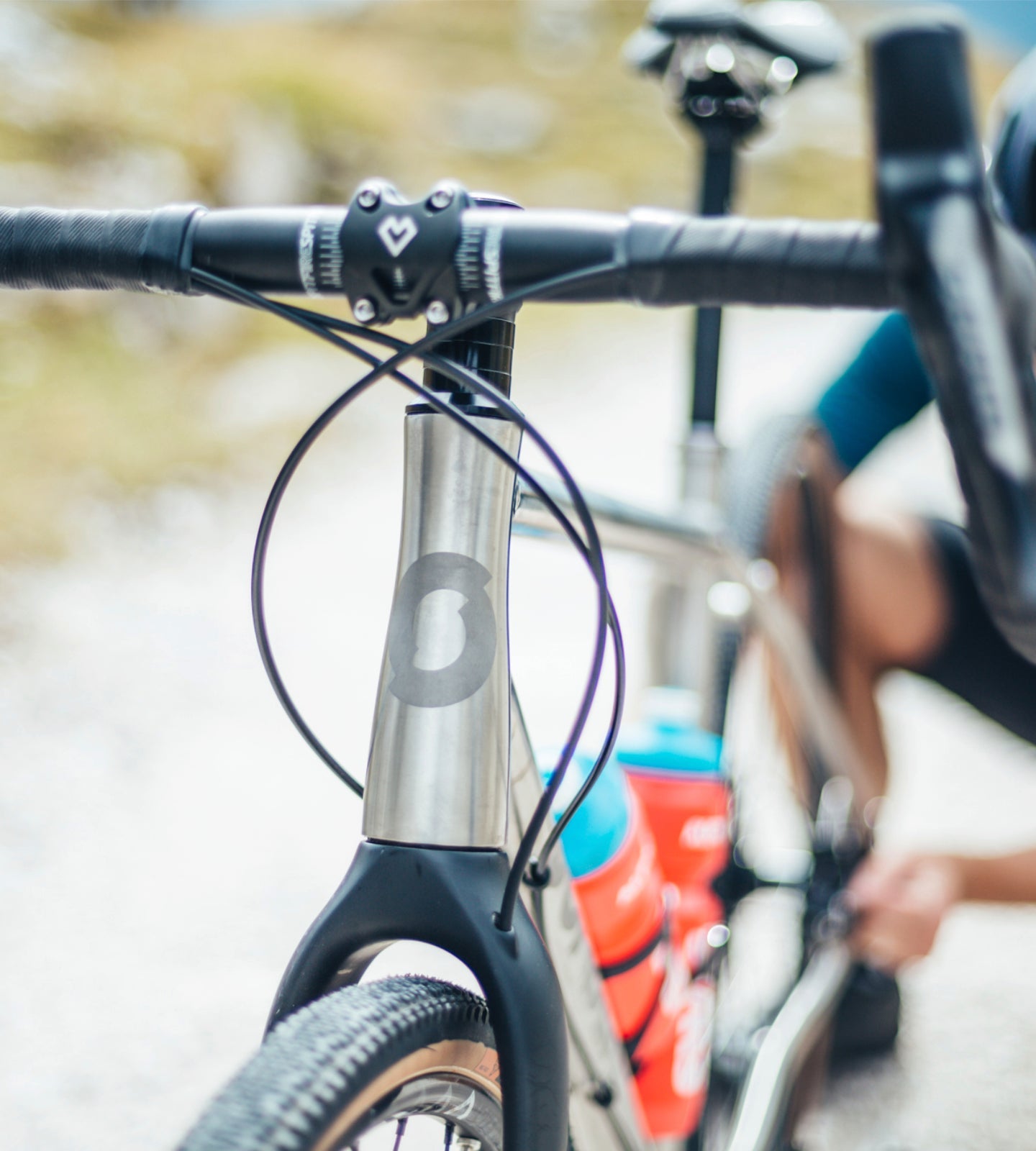 Cyclist adjusting his bike for a comfortable ride