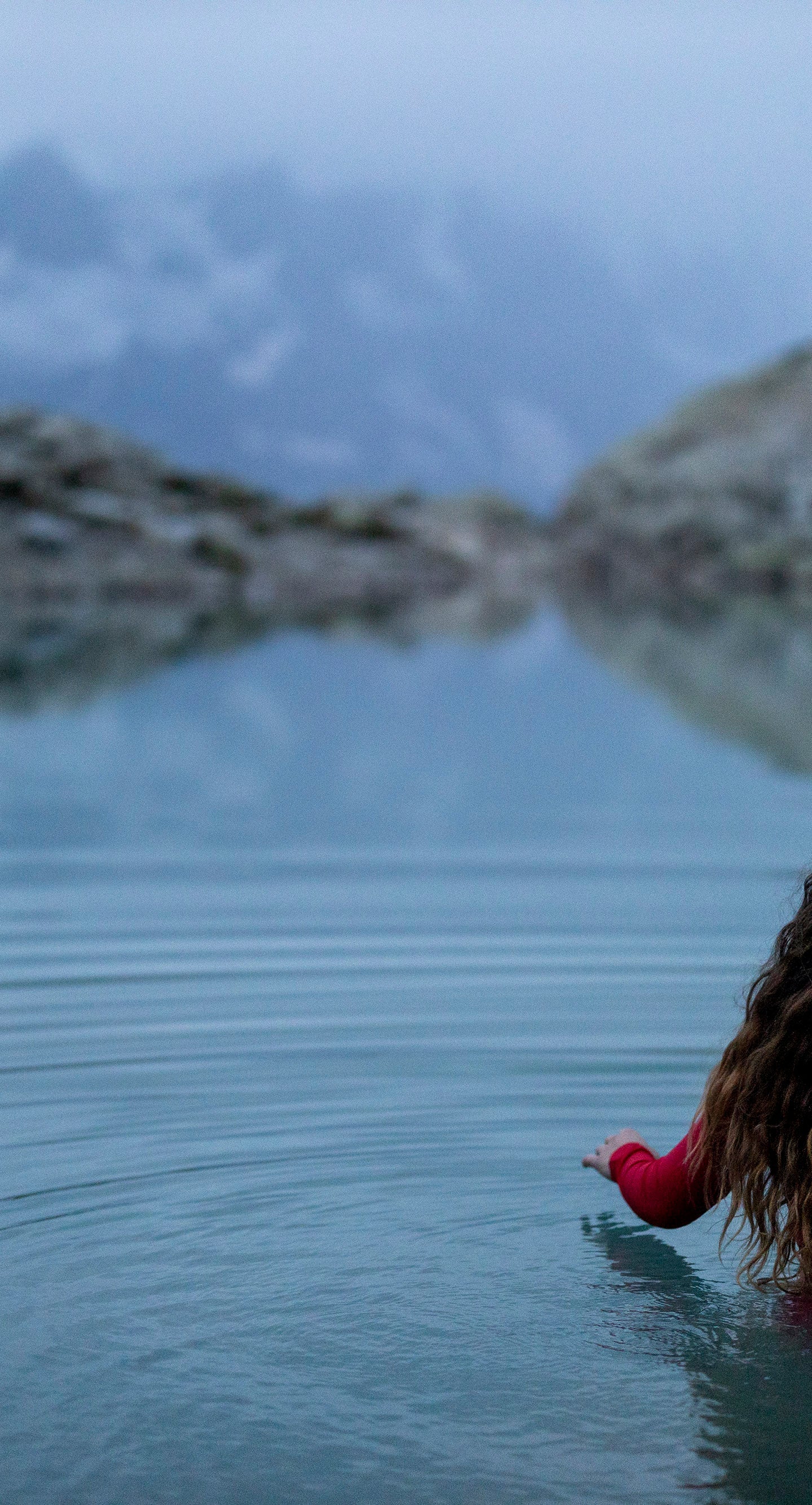 Wild swimming in a mountain lake