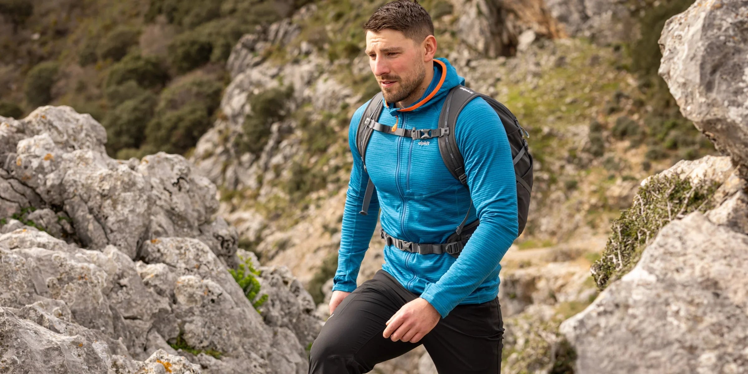 Hiker wearing a fleece mid layer