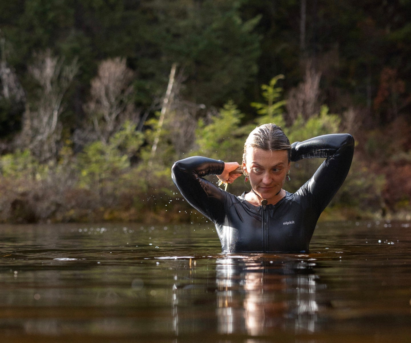Outdoor swimmer in clear loch