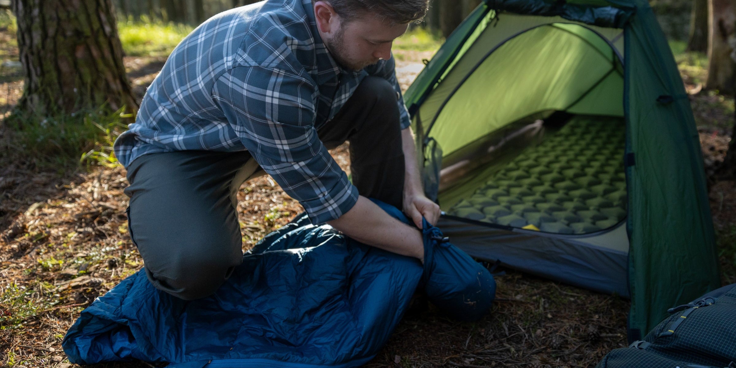 Compressing a compact lightweight summer sleeping bag