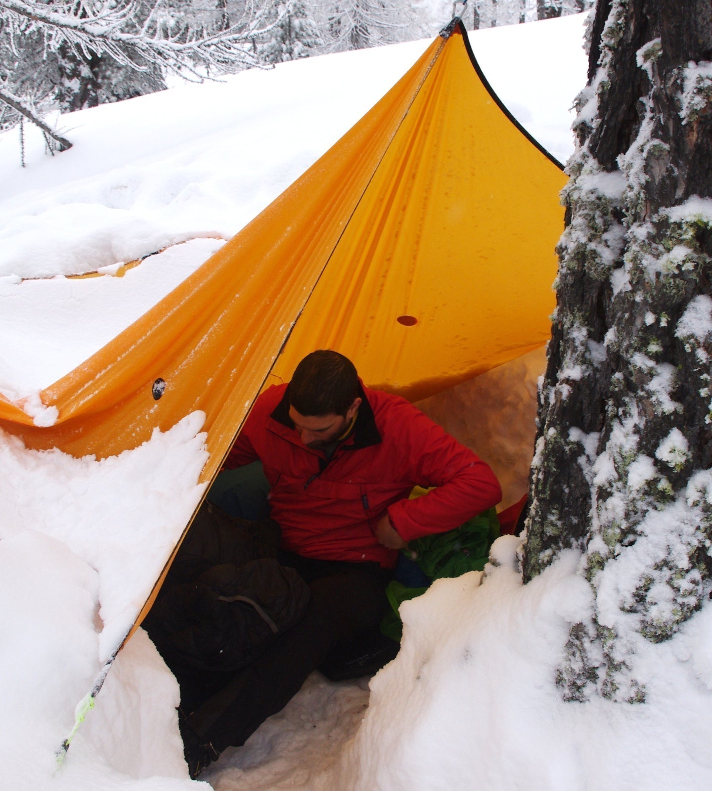 Bivvying under a tarp in snow