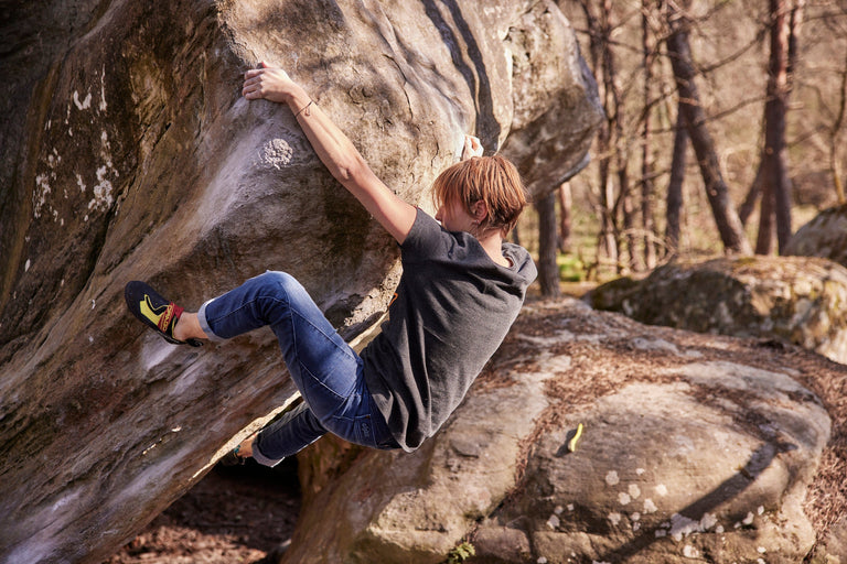 Zofia Reych bouldering in Font wearing the Sequence climbing jeans - action - closed