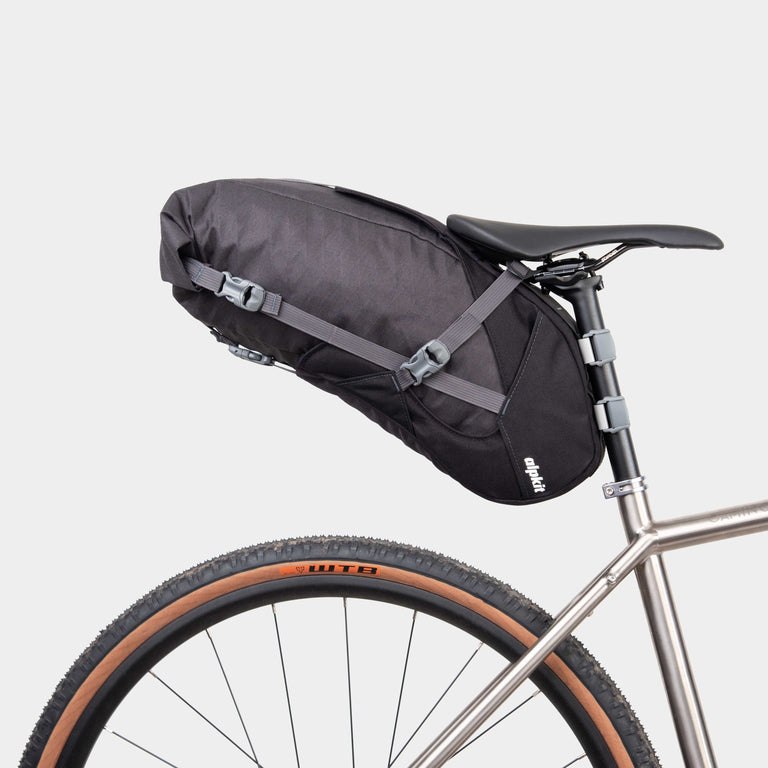 alpkit big papa 17 litre seatpack for bikepacking in panther black