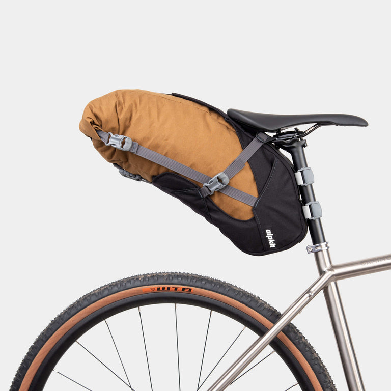 alpkit big papa 17 litre seatpack for bike packing in mountain brown