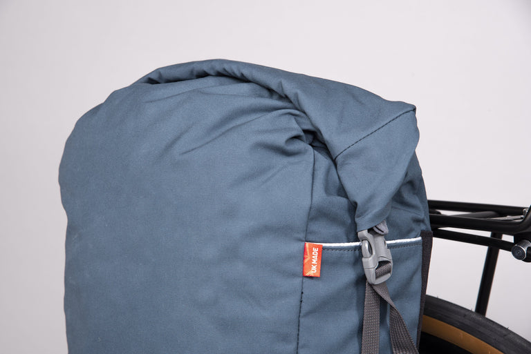 Alpkit caledonian 20 pannier bag in denim buckle- closed