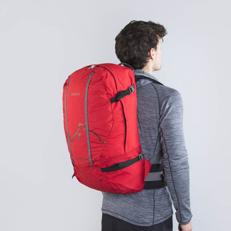 Man wearing the Red Chamois pack