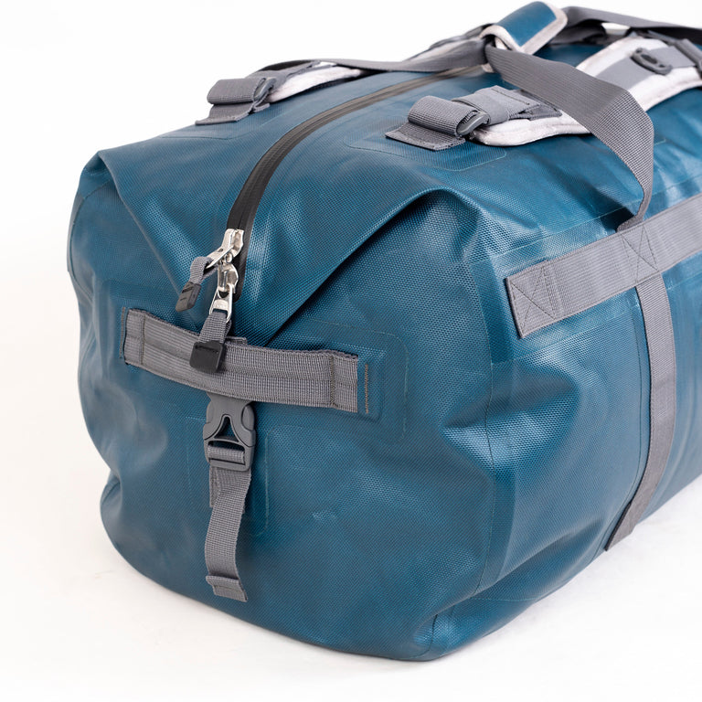 alpkit drydock 100L waterproof duffle bag gear bag in blue handle