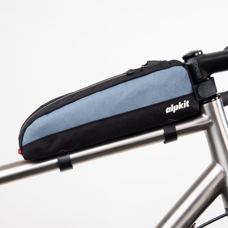 alpkit fuel pod long top tube bag for bikepacking in storm grey side - closed