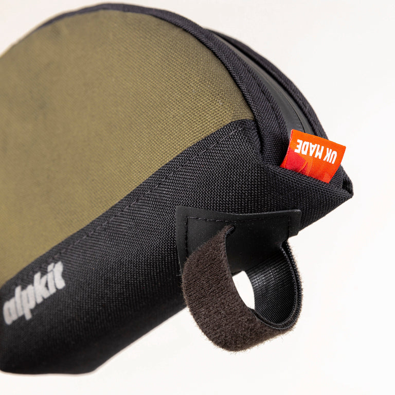 alpkit fuel pod rear bikepacking bag in olive green straps