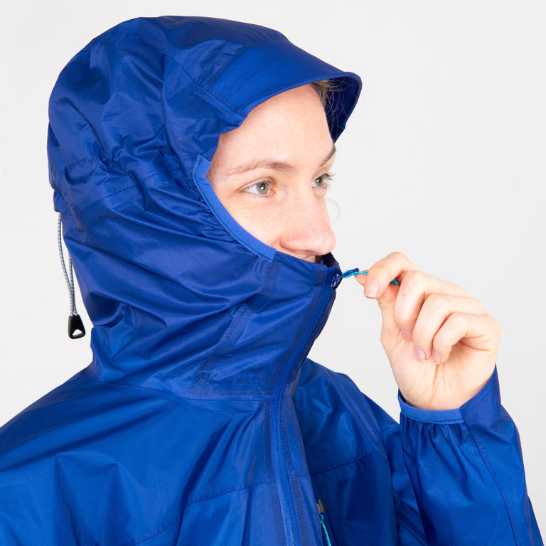 alpkit womens gravitas waterproof jacket in fontainebleau blue hood front|apy