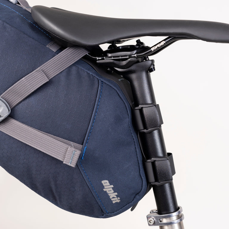 alpkit koala 13L seatpack in navy straps