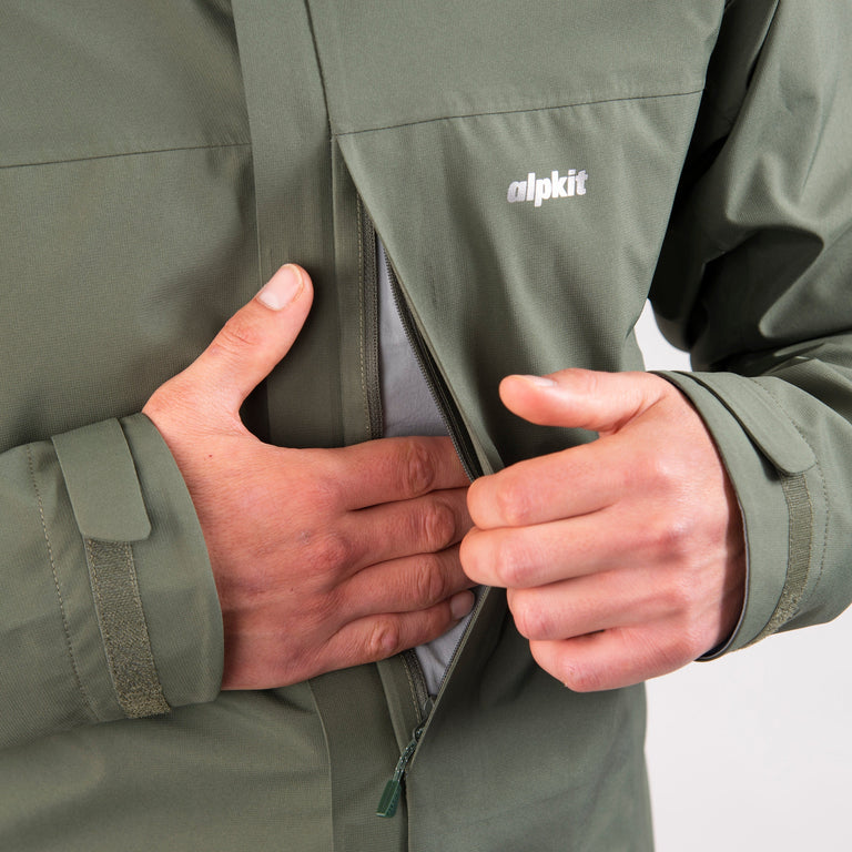 mens Alpkit fortitude waterproof jacket in alder green chest pocket