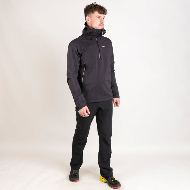 Alpkit men's Pulsar smock waterproof pullover jacket in Black outfit