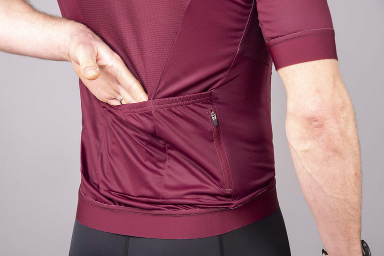 mens Alpkit rhythm elite cycling jersey in burgundy pocket