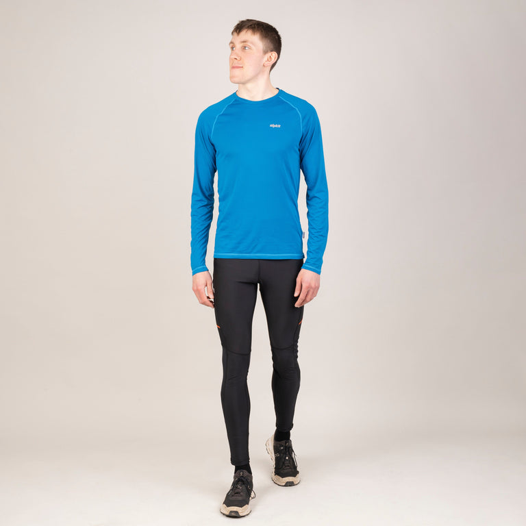 alpkit mens vayper long sleeve baselayer for trail running and fell running in reef blue outfit