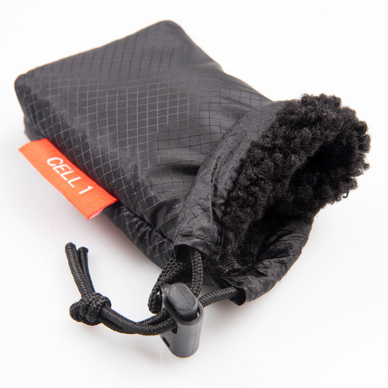 alpkit padded cell 1 small fleece lined accessory pouch in black detail