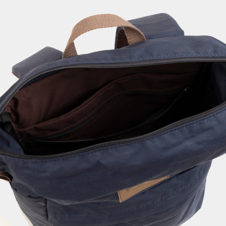 alpkit palm backpack in navy blue inside pockets  - closed