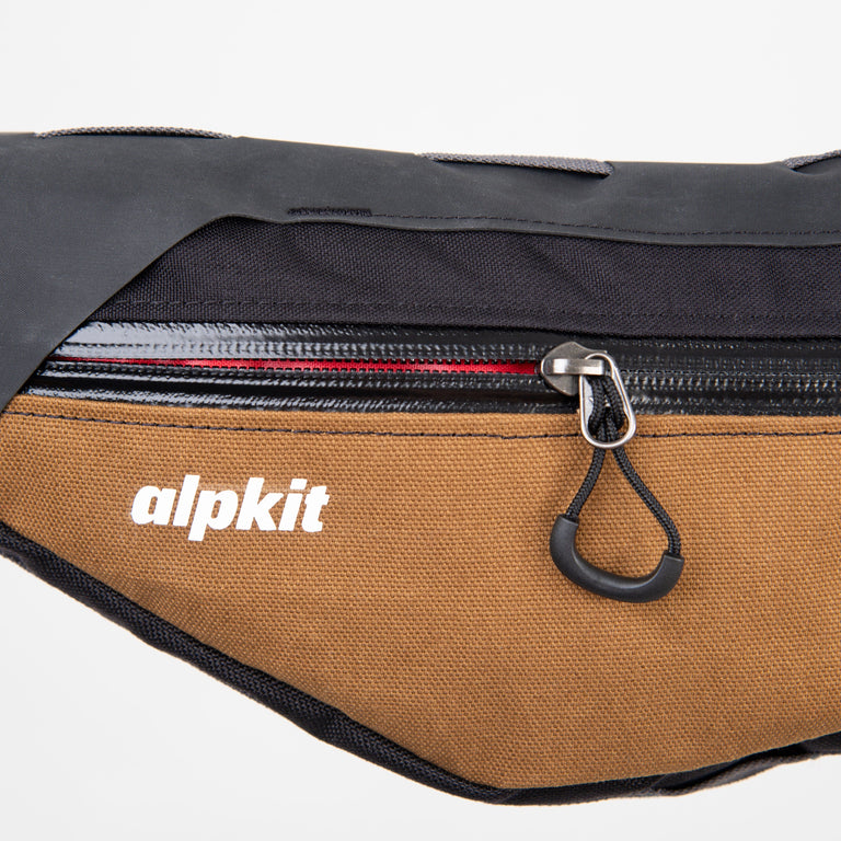 alpkit possum frame bag for bikepacking in mountain brown document pocket