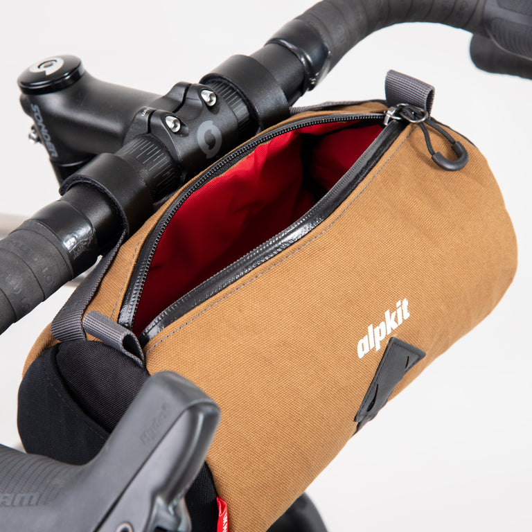 alpkit toploader zipped handlebar bag in mountain brown open - closed