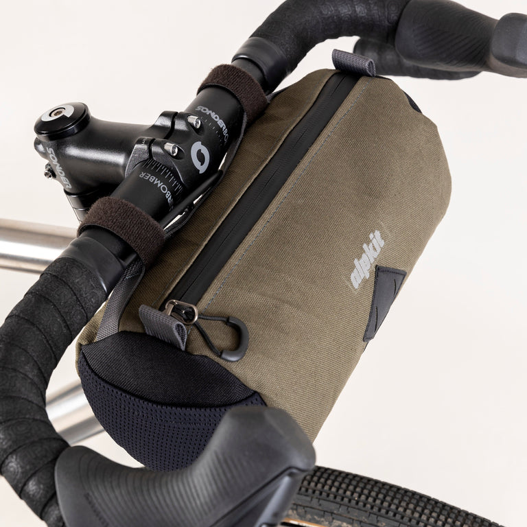 alpkit toploader zipped handlebar bag in olive green top