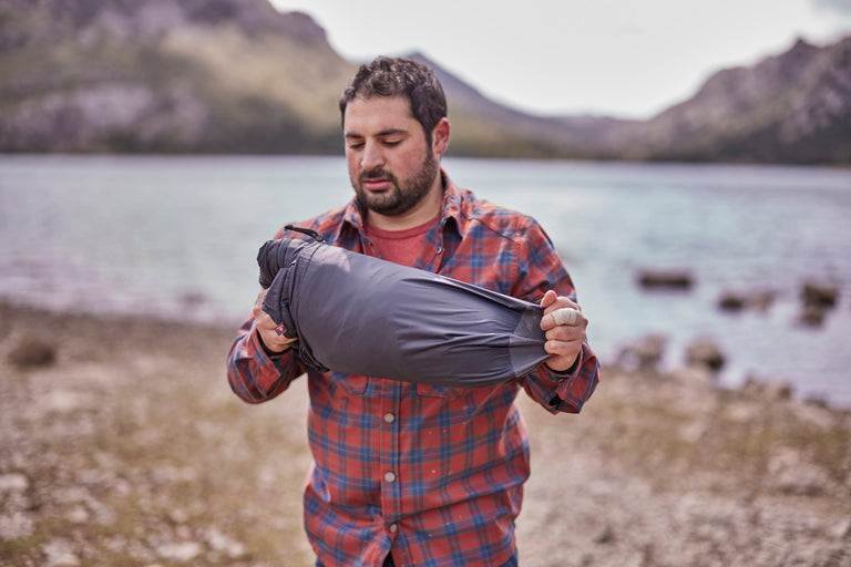 Yazan bikepacking with an ultralight PrimaLoft® sleeping bag - action - closed