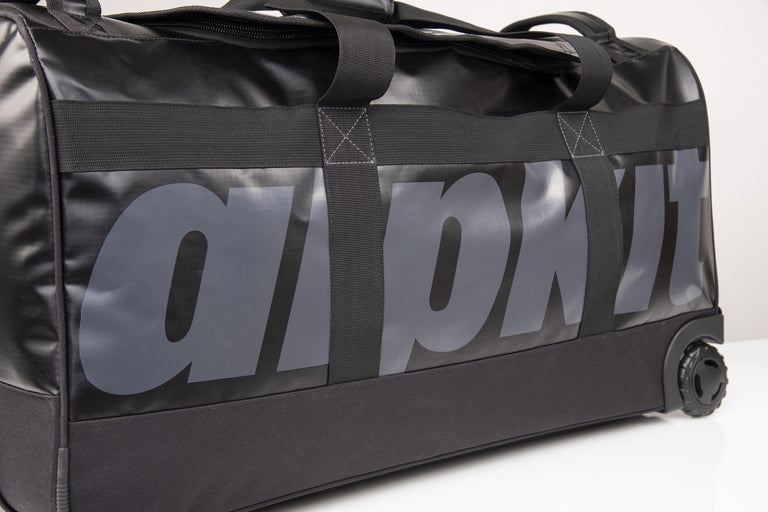 Alpkit voyager 90 litre duffle bag in black logo