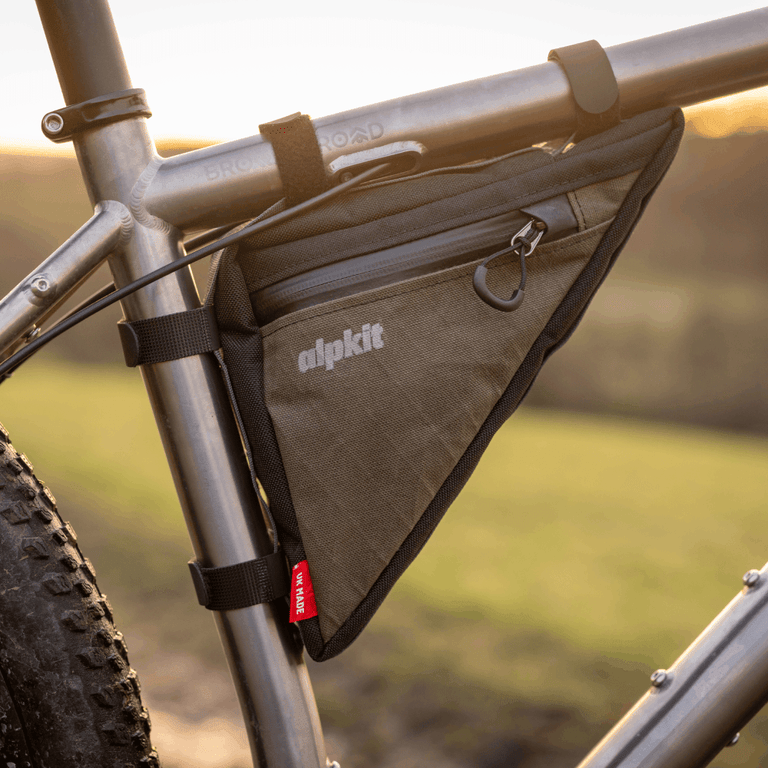 Alpkit Wombat rear frame bag in Olive green