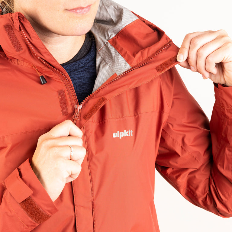 Alpkit women's Atalanta waterproof jacket in Brick red zip