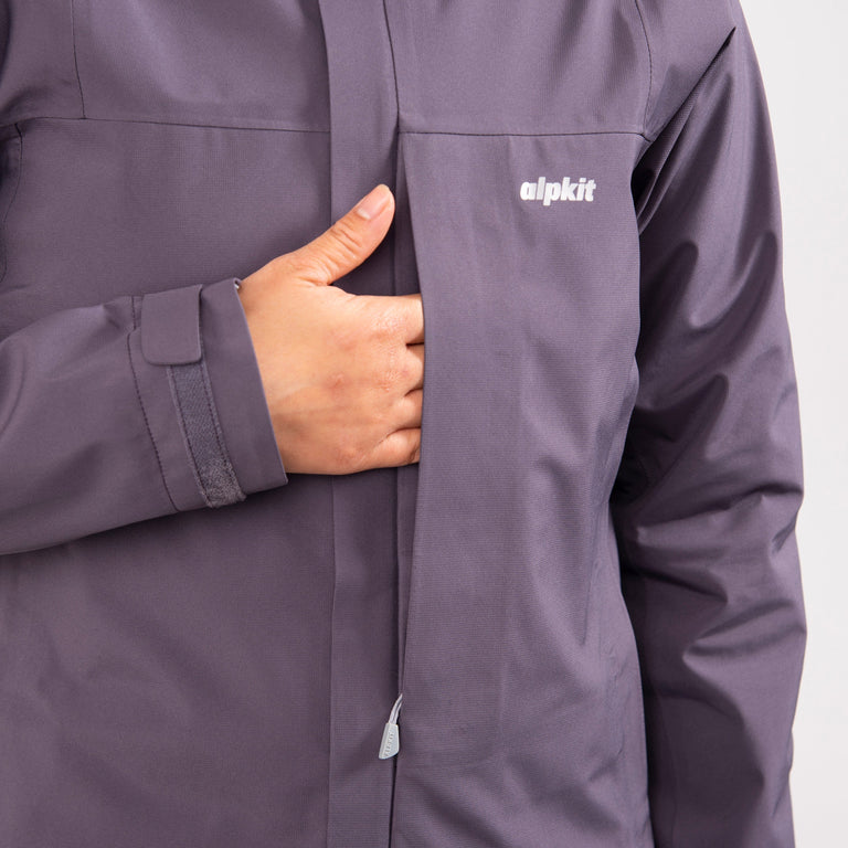 alpkit womens fortitude waterproof jacket in damson purple chest pocket